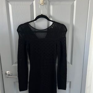 This black slim fitting dress size x-small!!